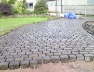 NATURAL COBBLES COMPLIMENT COUNTRY HOUSE